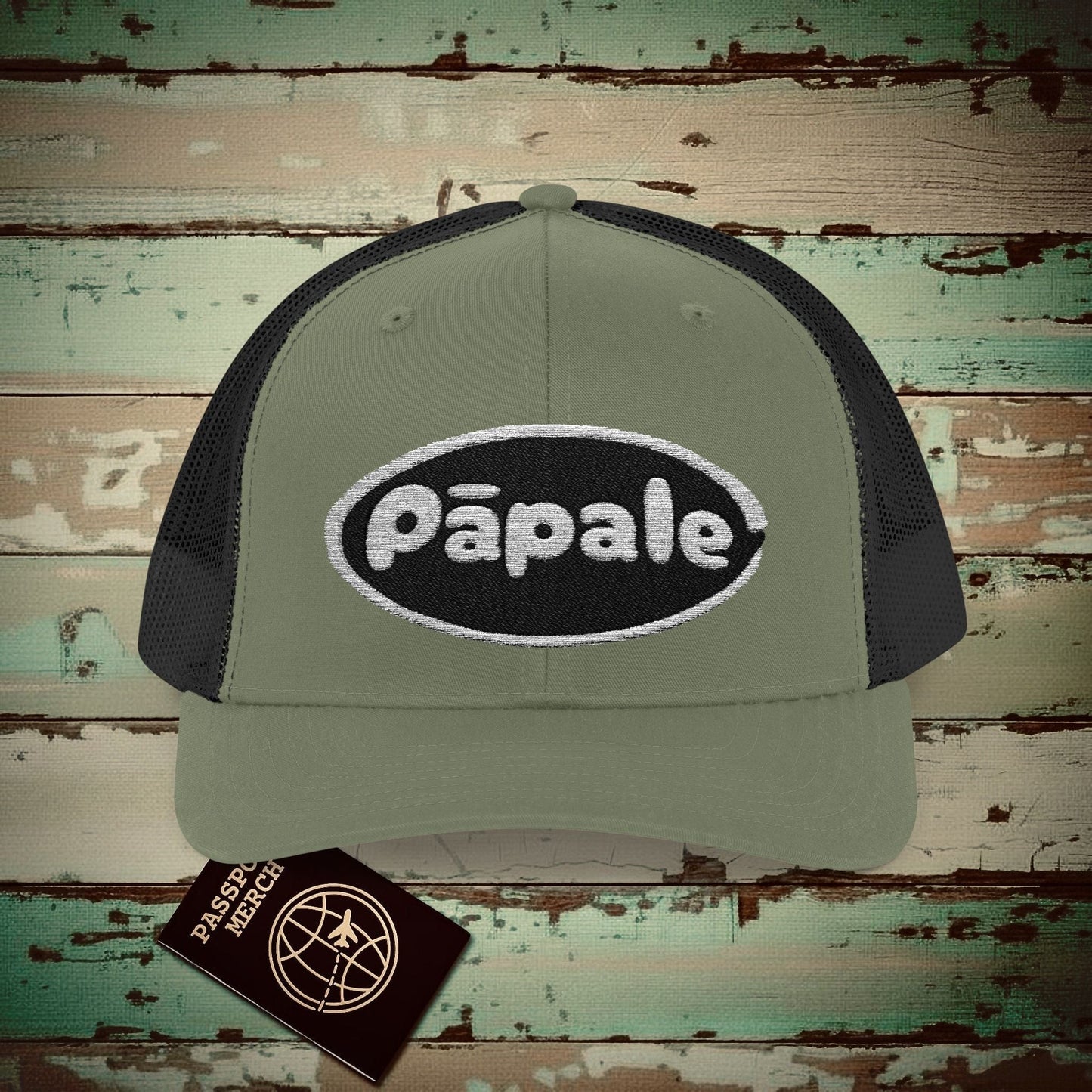 Hawaiian Language Embroidered Trucker Hat that says Hat (Papale) Loden / Black / One size