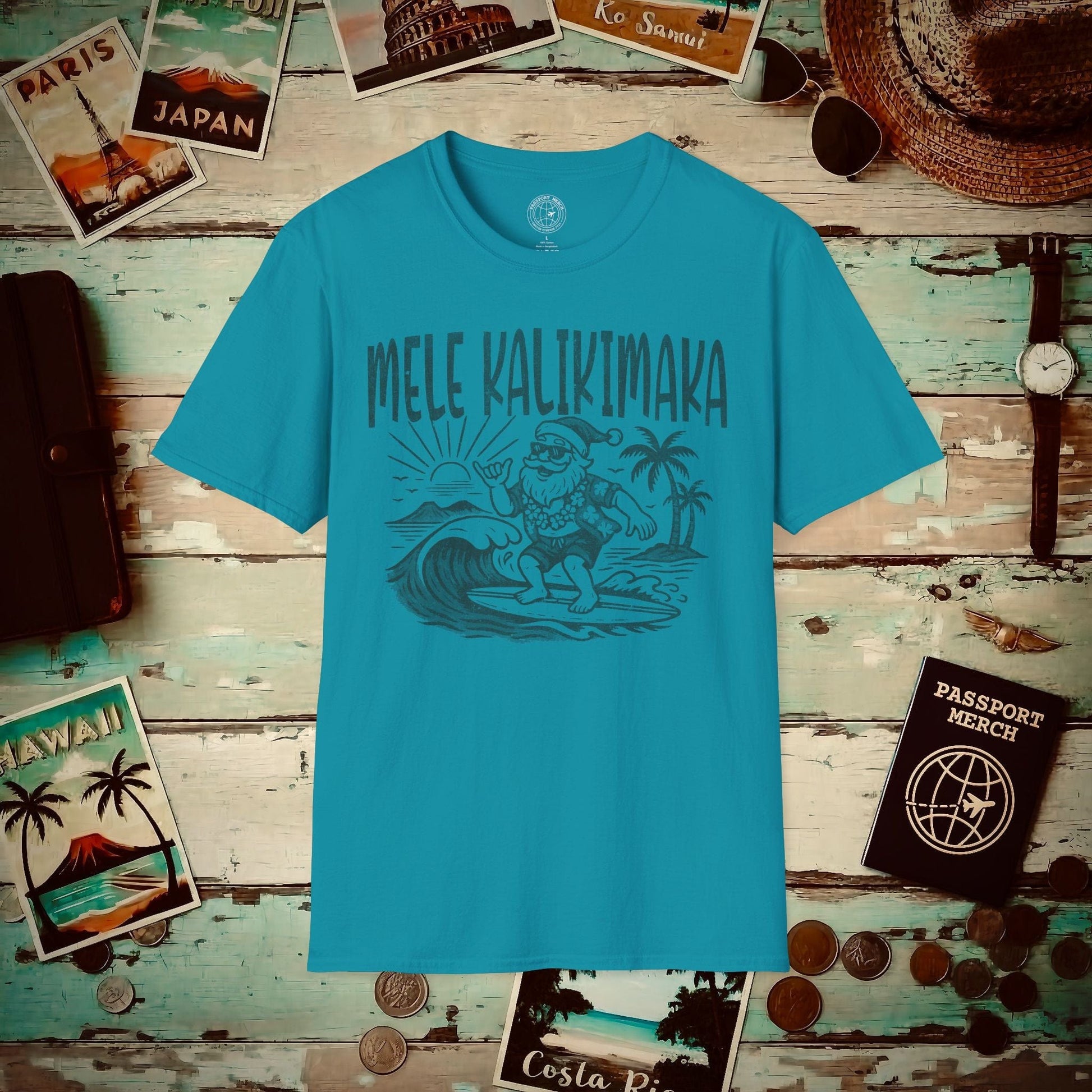 Vintage Surfing Santa, Mele Kalikimaka, Hawaii T-Shirt Tropical Blue / S